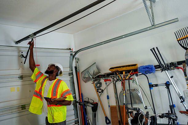 Professional Garage Door Roller Replacement technician working in Island Park, NY